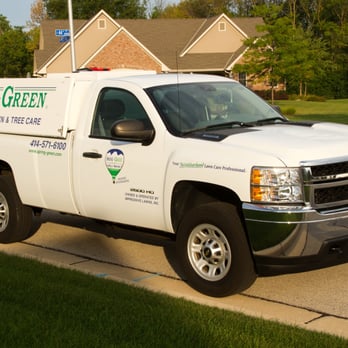 SpringGreen - a white truck parked in front of a house - Lawn Services Near Me - Milwaukee, Wisconsin SpringGreen - a white truck parked in front of a house - Lawn Services Near Me - Milwaukee, Wisconsin