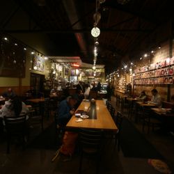 Coffee Garden - The center table is the perfect place to connect or enjoy the camaraderie.