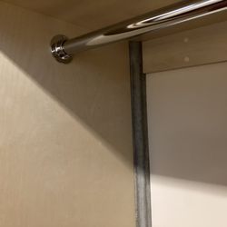 ARKA Cabinets - Quality hardware and cut perfectly to fit around concrete wall.