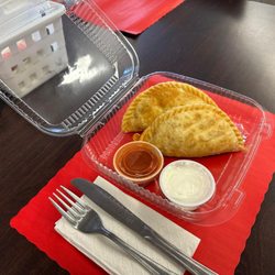 Fly By Cafe - Breakfast Empanadas with salsa or sour cream