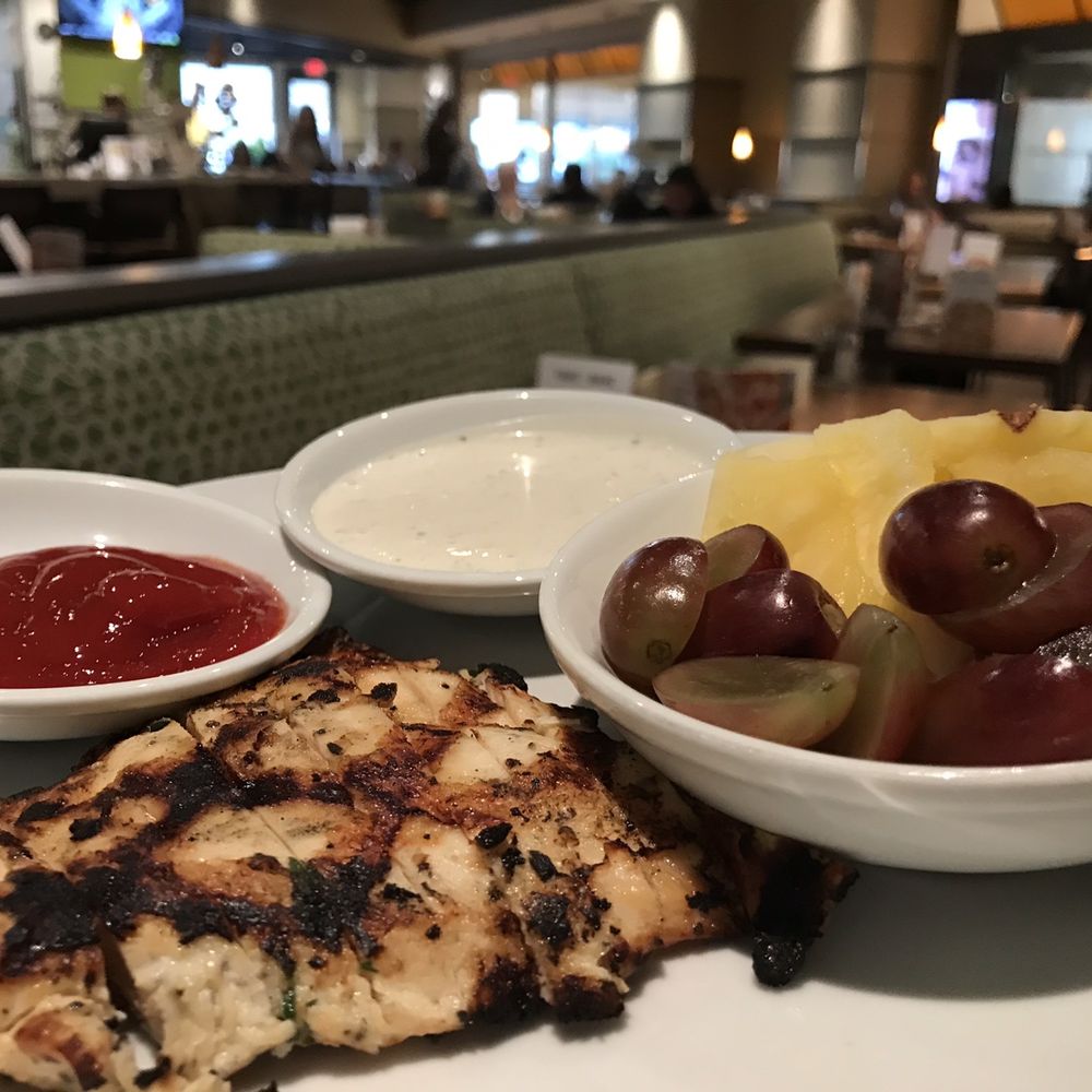 California Pizza Kitchen - Kids meal - grilled chicken, fruit, chocolate milk(not pictured) $5.99. It was a pretty good meal. - Pizza Near Me - Columbus, Ohio California Pizza Kitchen - Kids meal - grilled chicken, fruit, chocolate milk(not pictured) $5.99. It was a pretty good meal. - Pizza Near Me - Columbus, Ohio