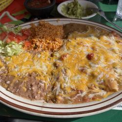 Sal and Teresa's - Combo cheese enchilada plate smothered in Green chile.