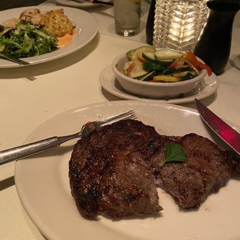 Opus 9 Steakhouse - Boneless 16 oz. Ribeye Steak and mixed vegetables - Steakhouses Near Me - Williamsburg, Virginia