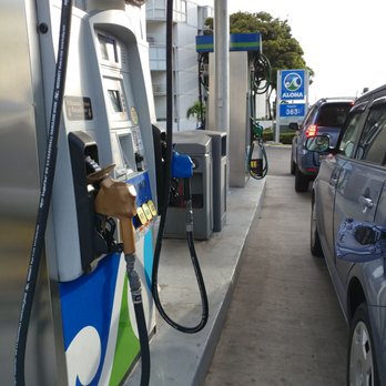 Aloha Petroleum - a gas pump and a car at a gas station - Gas Stations Near Me - Honolulu, Hawaii