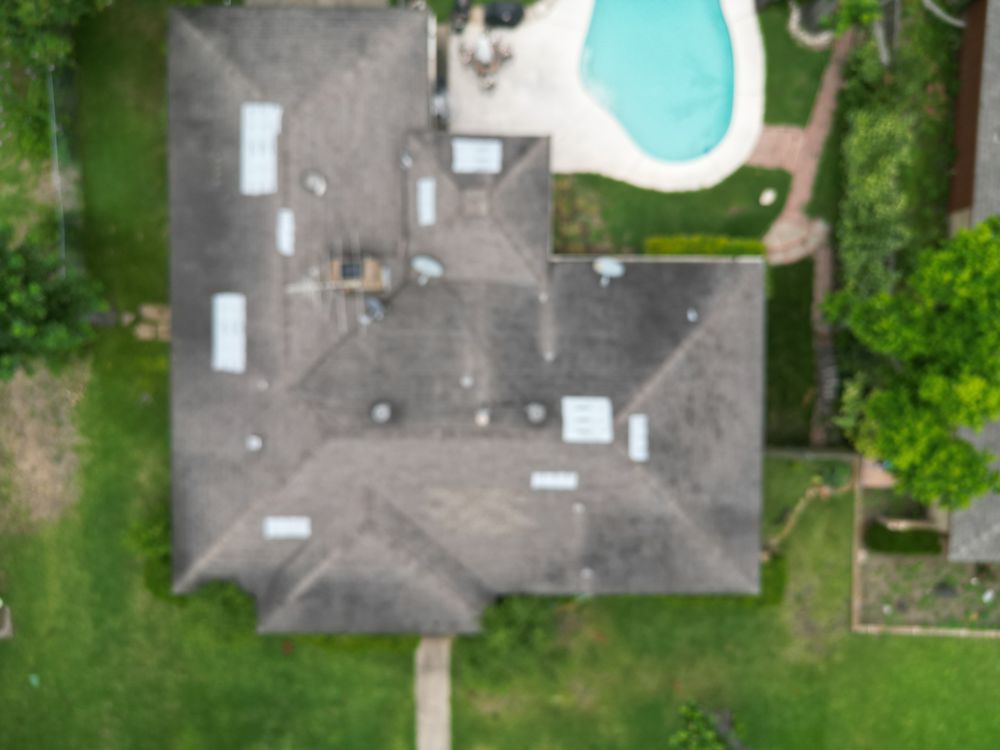 Slide of Taylored Roofing