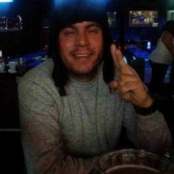 Perfect Games - Pollo enjoying his beer - Pizza Near Me - Ames, Iowa