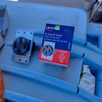 Valley Power & Lighting - Old 14-50 plug being replaced with a new plug marked for charging electric vehicles - Electricians Near Me Valley Power & Lighting - Old 14-50 plug being replaced with a new plug marked for charging electric vehicles - Electricians Near Me