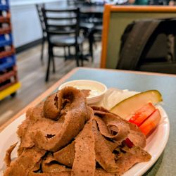 George's Gyros - A glimpse of part of the gyros 10 areplate