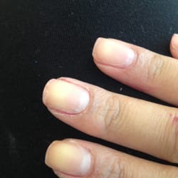 Nice One Nails - Walked in with no chips or peeling in my nails - the nail technician butchered it and buffed my nails with a nail file.