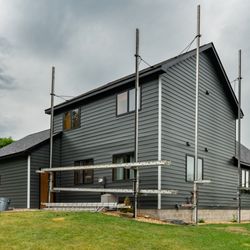 Krumm Exteriors - Following storm damage, this New Richmond home got a serious upgrade to their siding, roofing, and gutters.