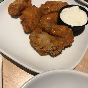 Boston Pizza - a plate of chicken nuggies and fries - Pizza Near Me - Langley, British Columbia