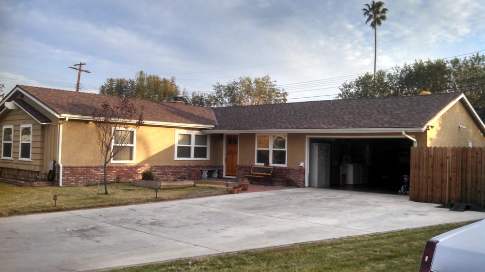 Slide of Wolfe Roofing Company