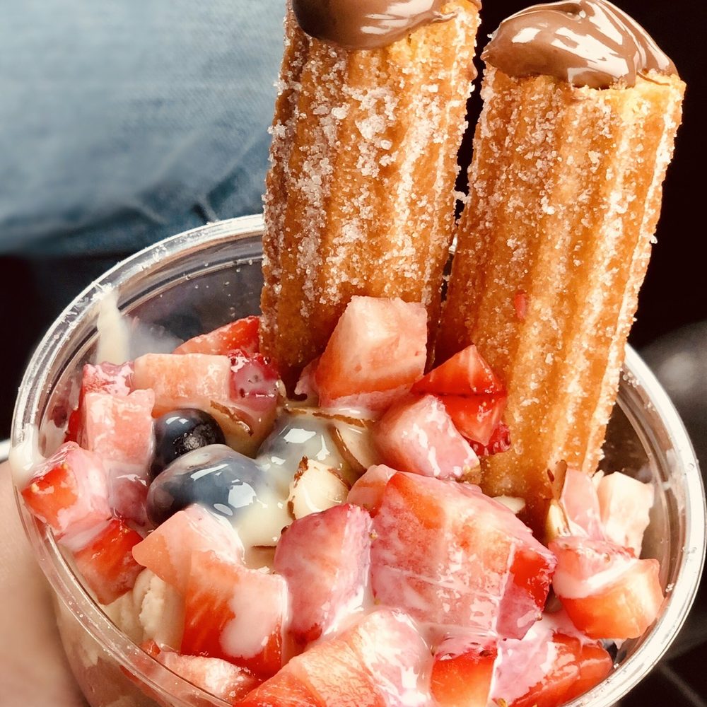 Very berry churro sundae topped with lechera-filling is Nutella.