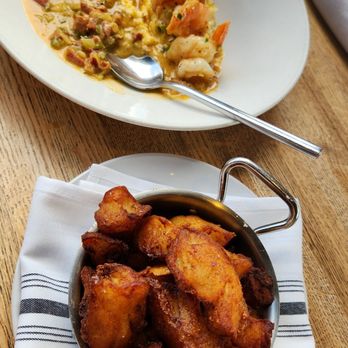 Showroom - Shrimp and Grits with a side of Duck Fat Fried Potatoes. - New American Near Me - Frederick, Maryland Showroom - Shrimp and Grits with a side of Duck Fat Fried Potatoes. - New American Near Me - Frederick, Maryland