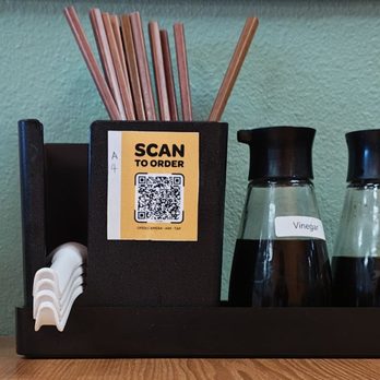 Tasty House - Utensils and sauces at each table - Chinese Near Me - San Diego, California
