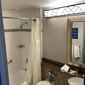 Hilton Anchorage - Small bathroom with low shower head - Hotels Near Me - Anchorage, Alaska Hilton Anchorage - Small bathroom with low shower head - Hotels Near Me - Anchorage, Alaska