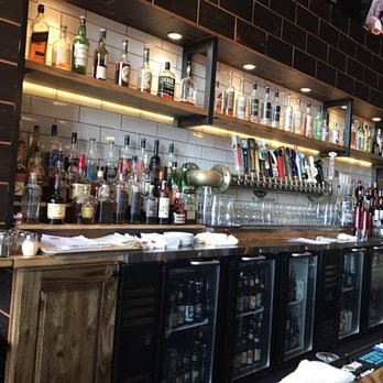 Fixture Pizza Pub - Clean, organized bar with a good selection to taps. - Pizza Near Me - Milwaukee, Wisconsin