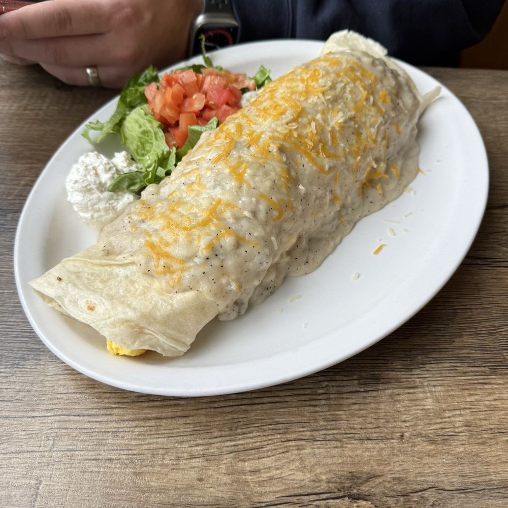 Doug's Day Diner - Breakfast burrito with gravy ( added chili later) - Breakfast & Brunch Near Me - Loveland, Colorado