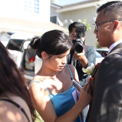 Simplici Thi - Thi ensuring my groom looked his best before our Tea Ceremony. She was truly a lifesaver for us on our wedding day.