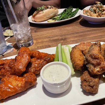 Yard House - Buffalo wings and lemon pepper sauce - New American Near Me - Boca Raton, Florida Yard House - Buffalo wings and lemon pepper sauce - New American Near Me - Boca Raton, Florida