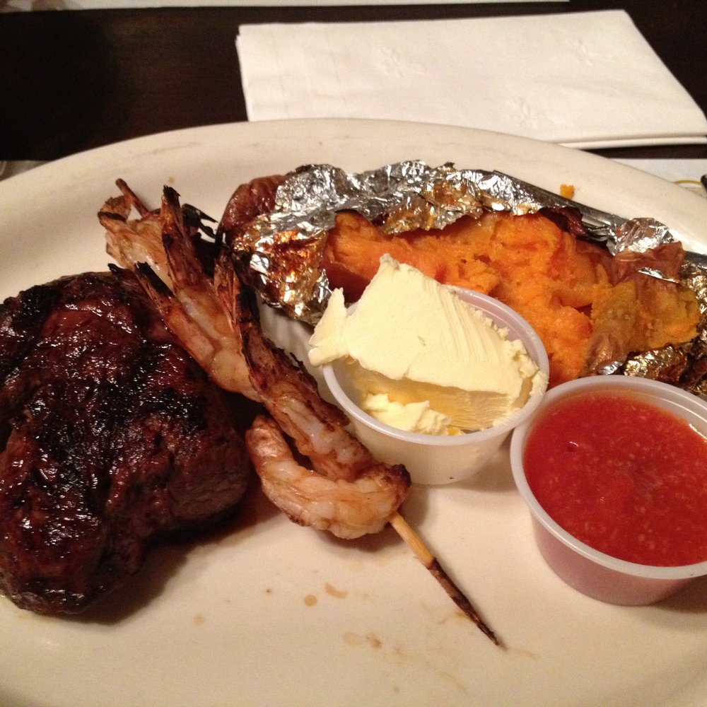 Russell's Beef House Restaurant - filet, shrimp skewer, baked sweet potato - Steakhouses Near Me - Corinth, Mississippi