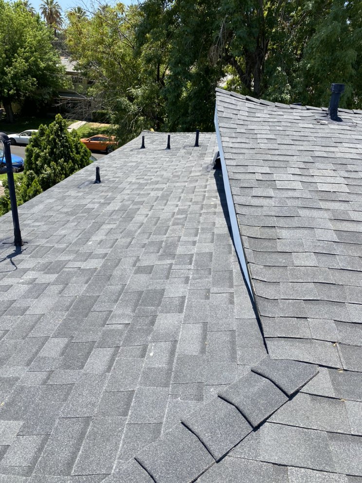 Slide of H&M ROOFING