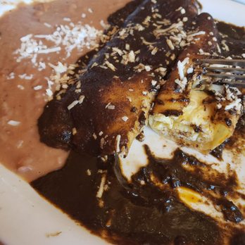 Teresa's Mosaic Cafe - Mole/egg breakfast enchiladas with refried beans. Very good! - Mexican Near Me - Tucson, Arizona
