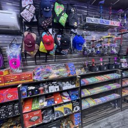 Sunrise Convenience & Exotic + Smoke Shop - Back bags & hats