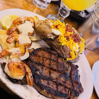 Texas Roadhouse - Ribeye* 12oz & Grilled Shrimp with fully loaded Baked Potato - Steakhouses Near Me - Logan, Utah Texas Roadhouse - Ribeye* 12oz & Grilled Shrimp with fully loaded Baked Potato - Steakhouses Near Me - Logan, Utah