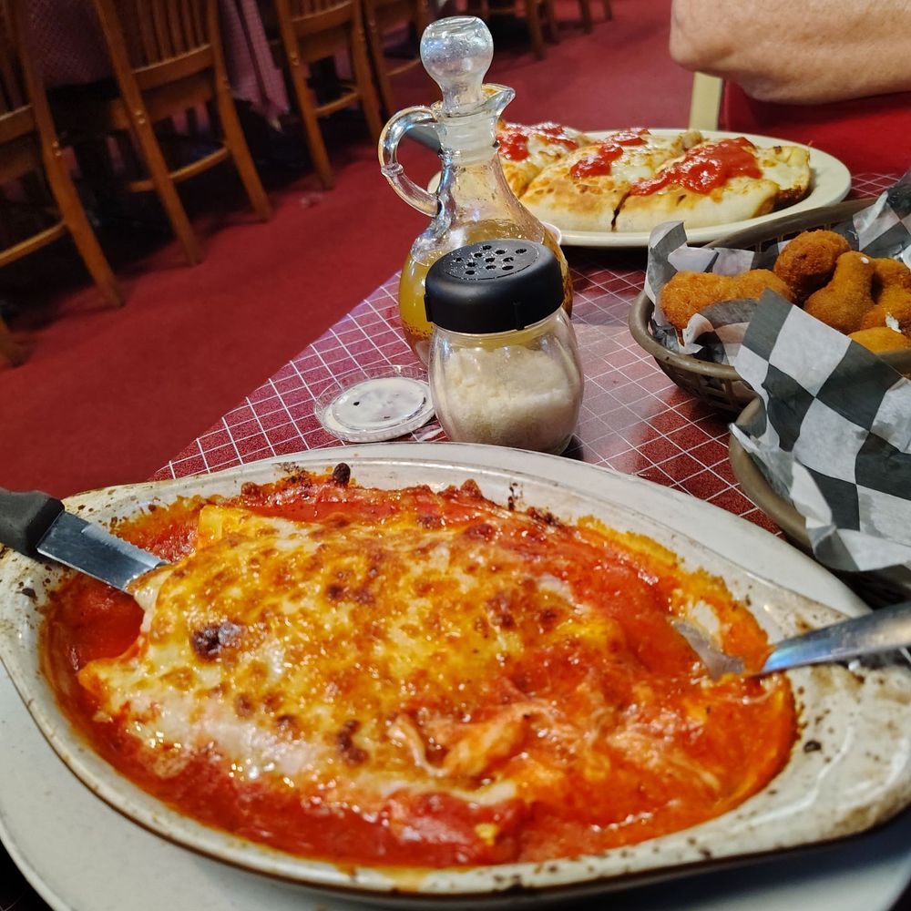 Awesome manicotti, stromboli, Greek salad, fried mushrooms served by the most amazing server, Charlie! Great food with great prices! Awesome manicotti, stromboli, Greek salad, fried mushrooms served by the most amazing server, Charlie! Great food with great prices!