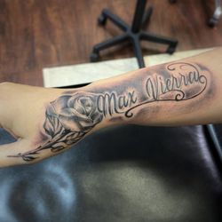 Empire Art Studio - Rose/name tattoo