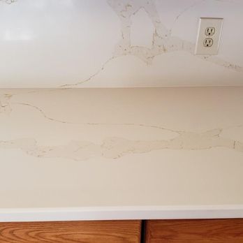 8A Colorado Stone - Here is a close-up of the quartz countertop. This is the main countertop. The Vains are very light but that what my parents wanted. - Cabinetry Near Me - Brighton, Colorado