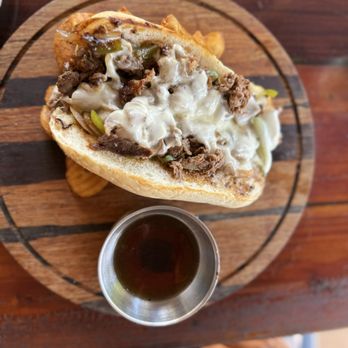 Stonefish Grill - Ribeye cheesesteak sandwich and fries - Seafood Near Me - Haleiwa, Hawaii Stonefish Grill - Ribeye cheesesteak sandwich and fries - Seafood Near Me - Haleiwa, Hawaii