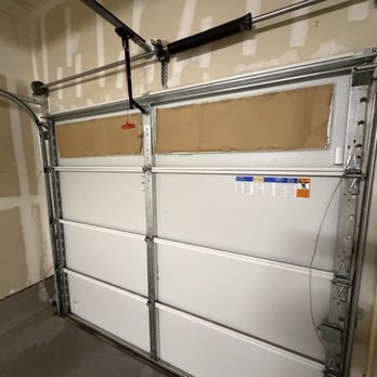 Garage Door Guys - Broken sprint with cable loose. Before the replacement. - Garage Door Services Near Me - San Jose, California