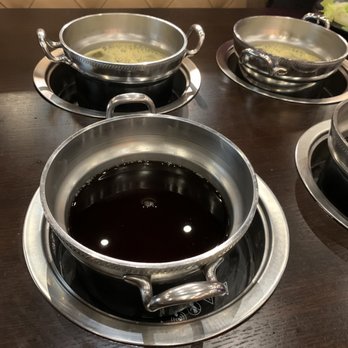 Shabu-Yo - Sukiyaki and chicken broth awaiting a boil - Japanese Near Me - Schaumburg, Illinois Shabu-Yo - Sukiyaki and chicken broth awaiting a boil - Japanese Near Me - Schaumburg, Illinois
