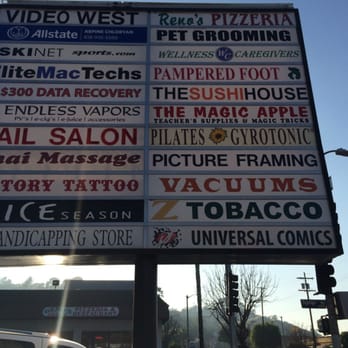 DJ's Universal Comics - DJ comics sign from road (lower right) - Comic Books Near Me - Studio City, California
