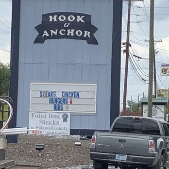 Hook & Anchor - a truck pulling a trailer behind it - Seafood Near Me - Marion, North Carolina