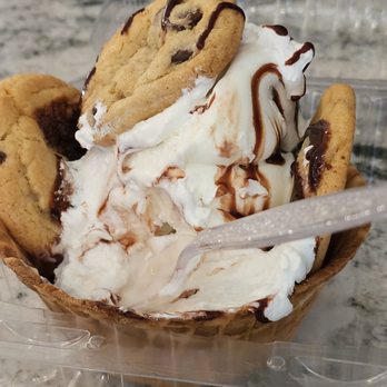 Twisted Cookie - A dessert cup contains whipped cream, chocolate drizzle, and chocolate chip cookies, served in a clear plastic container. - Bakeries Near Me - Forest Park, Illinois