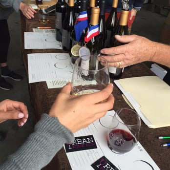 Urban Wine Row - a group of people clinking glasses of wine - Wine Tasting Room Near Me - Marina, California Urban Wine Row - a group of people clinking glasses of wine - Wine Tasting Room Near Me - Marina, California