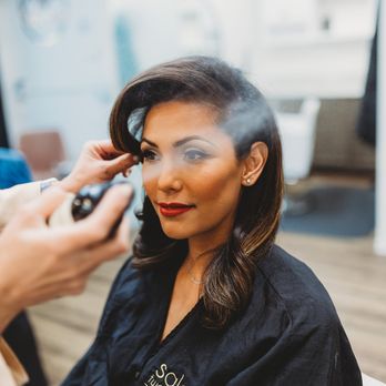 Salon Two Twenty - A quick spritz of Oribe's Superfine's super strong hairspray will lock and hold your style with  natural shine. - Hair Salons Near Me - Lodi, California