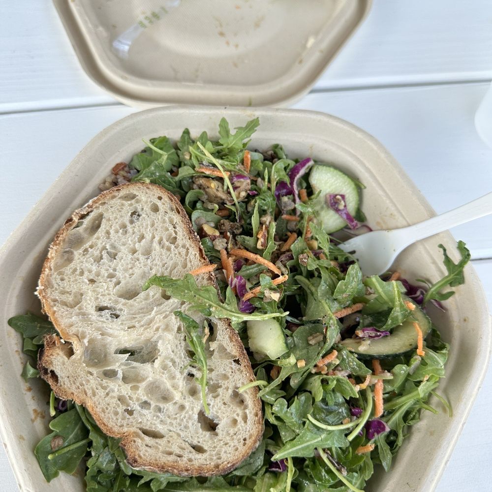 a bowl of salad and a sandwich a bowl of salad and a sandwich