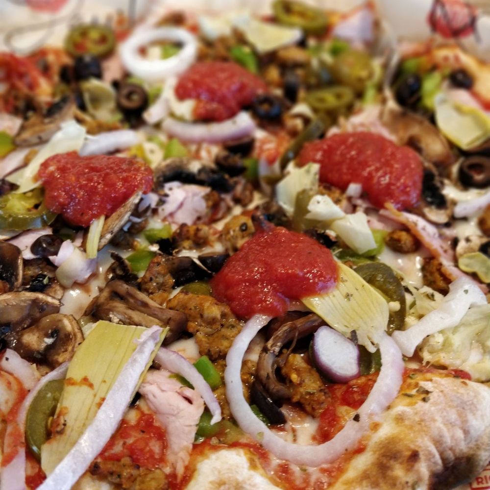 MOD Pizza - Mod 11" pizza finished with red sauce on top. - Fast Food Near Me - Kingwood, Texas MOD Pizza - Mod 11" pizza finished with red sauce on top. - Fast Food Near Me - Kingwood, Texas