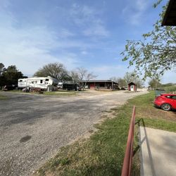 Brazos Outdoor Center - Store on left, entrance on right, bathrooms far right. Looking out from in the grounds.