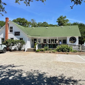 The Kind Cup - Front entrance / exterior of the shop with plenty of onsite parking available. Front porch has seating to sit and sip. - Coffee & Tea Near Me - Corolla, North Carolina The Kind Cup - Front entrance / exterior of the shop with plenty of onsite parking available. Front porch has seating to sit and sip. - Coffee & Tea Near Me - Corolla, North Carolina