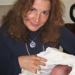 Body & Soul Healing Arts - Holding a little one.