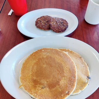 Toasted Cafe - Fluffy blueberry pancakes with turkey sausage. - New American Near Me - Margate, Florida