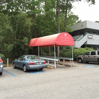Hinoki - Entrance from parking lot, restaurant front is hidden behind the trees - Japanese Near Me - Hilton Head Island, South Carolina Hinoki - Entrance from parking lot, restaurant front is hidden behind the trees - Japanese Near Me - Hilton Head Island, South Carolina