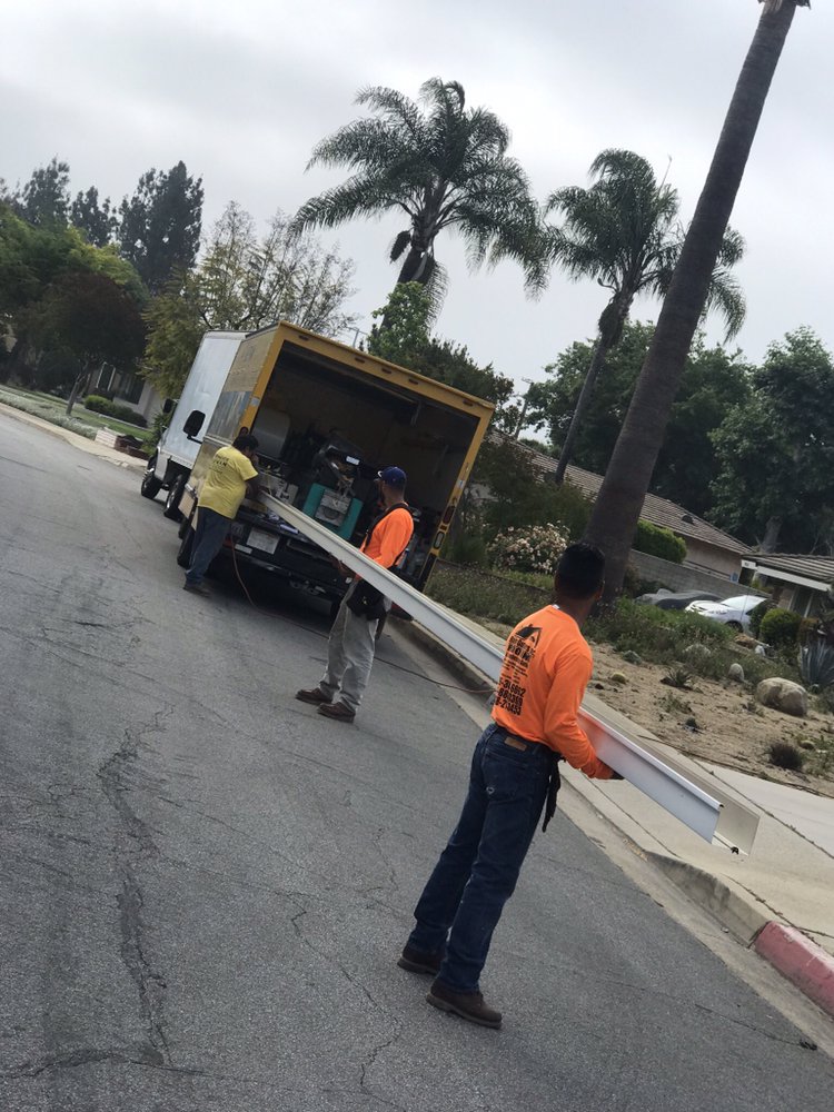 Slide of MA Roofing and Gutters