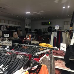 Forever 21 - They don't even bother having lights in the plus size section. How hurtful. Never returning.
