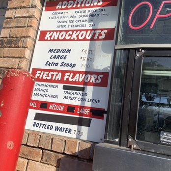 MC Snow Cones - a brick building with a sign on it - Shaved Ice Near Me - Arlington, Texas